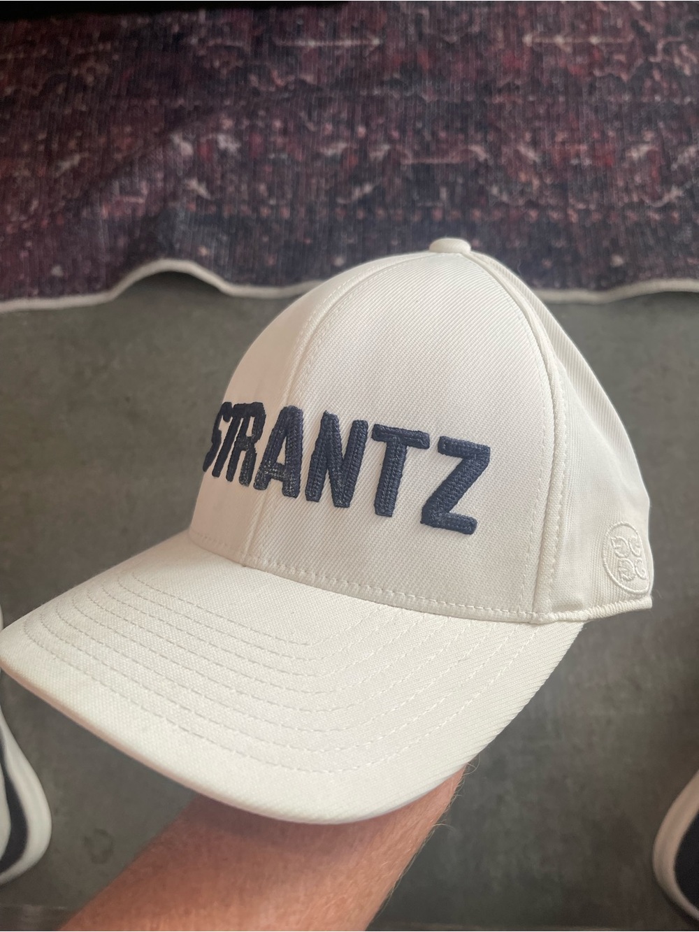G/FORE White Baseball Cap with Navy 'STRANTZ' Embroidery